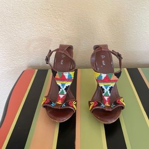 Size 6, multi-colored beaded platform shoes.